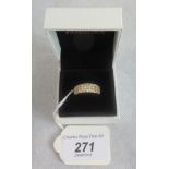 A banded diamond banded half-hoop ring,