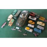 A 1920's clockwork Dick Tracy police squad car, together with other play worn Dinky toys.