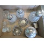 A quantity of silver topped scent bottles, heart shaped pierced dish,
