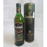 A bottle of Glenfiddich 12 Year Old Single Malt Scotch Whisky.