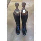 A pair of leather riding boots.