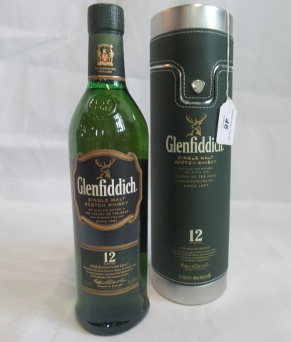 A bottle of Glenfiddich 12 Year Old Single Malt Scotch Whisky.