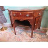 A 19th century mahogany demi-lune side cabinet,