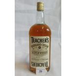 A 1.13 ltr bottle of Teacher's Highland Cream Scotch Whisky.