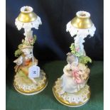 A pair of Capodimonte candlesticks.