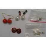 A pair of coral bead pendant earrings,