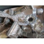 Two pairs of silver sugar tongs, two silver backed hair bushes,