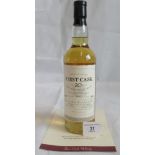 A bottle of 1990 First Cask Glen Elgin Single Malt Scotch Whisky.