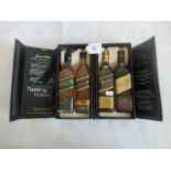 A four bottle presentation pack of Scotch Whisky, to include: Johnny Walker Green Label,