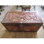 An early 20th century carved oak camphor wood chest.