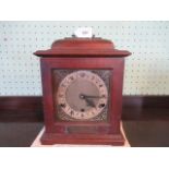 An early 20th century oak cased mantle clock.