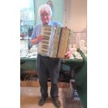 A Francesco piano accordion (damaged).