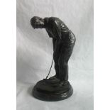 A 20th century bronze sculpture study of a golfer on marble plinth.