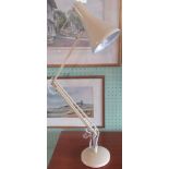 A 20th century cream angle poise lamp.