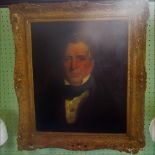 A 19th century gilt framed oil on board portrait of a Victorian gentleman.