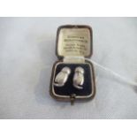 A pair of early 20th century silver Vibraphone ear tubes with patent no.