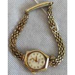 A 9ct gold cased Everite lady's wristwatch, with gold plated adjustable strap.