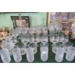 A large quantity of crystal glassware, to include: decanters, brandy balloons and wine glasses.