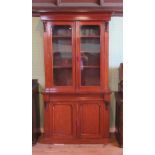 A Victorian mahogany cupboard bookcase,