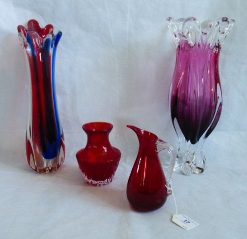 Four items of coloured glass.