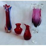 Four items of coloured glass.