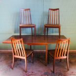 A mid-20th century mahogany and rosewood G-plan dining suite,