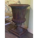 A large pair of 20th century cast iron garden urns. Condition Report: 80cm high.