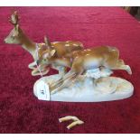 A Royal Dux figure of a pair of deer (AF).