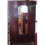 An Edwardian mahogany single wardrobe,