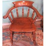 A 19th century oak captain's chair.