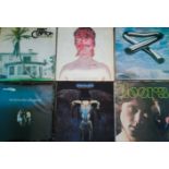 A box of 20 vinyl LP's, to include: David Bowie, The Doors, Tubular Bells by Mike Oldfield,