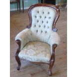 A 19th century mahogany framed fireside chair,