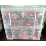 A large quantity of mixed and loose Lego, contained in two perspex lidded boxes.