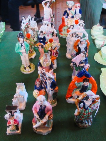 A collection of 19th century and later Staffordshire figures and flat backs,