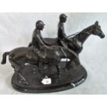 A 20th century bronze figural group, a pair of horses with riders on marble plinth.