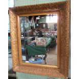 A late 19th/early 20th century gilt framed wall mirror.