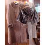 A lady's full length pure wool coat with fur collar,