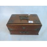 A 19th century oak and brass bound tobacco box.