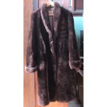 A lady's bearskin three-quarter length coat.