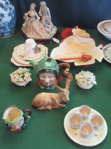 A Carltonware leaf shaped salad bowl, together with a Carltonware cruet, a Beswick Reindeer,