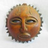 A 20th century carved African Baule Sun entertainment mask.