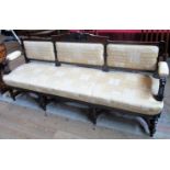 A 19th century mahogany framed three/four seater settee, with gold upholstery and Latin verse,