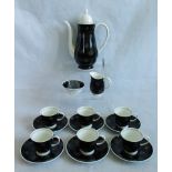 A Susie Cooper stylized black and white coffee service, comprising: six cups & saucers, milk jug,