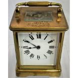 A 19th century brass and five glass chiming carriage clock.