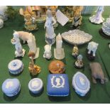 A collection of miscellaneous table ornaments, to include: five items of Wedgwood,