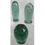 Three green glass dumps.