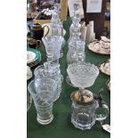 Twelve items of moulded glassware, to include: decanters, candlesticks, biscuit barrel,