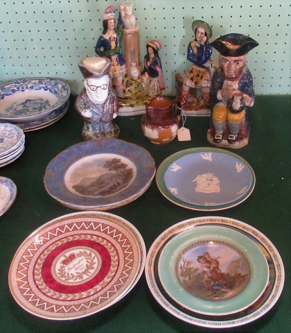 A collection of eight various plates,