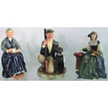 A collection of three Royal Doulton figurines: The Gamekeeper HN2879,