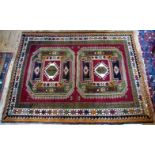 A small caucasian patterned rug, 172 x 130cm.